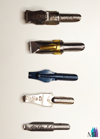 plumas para cartelería